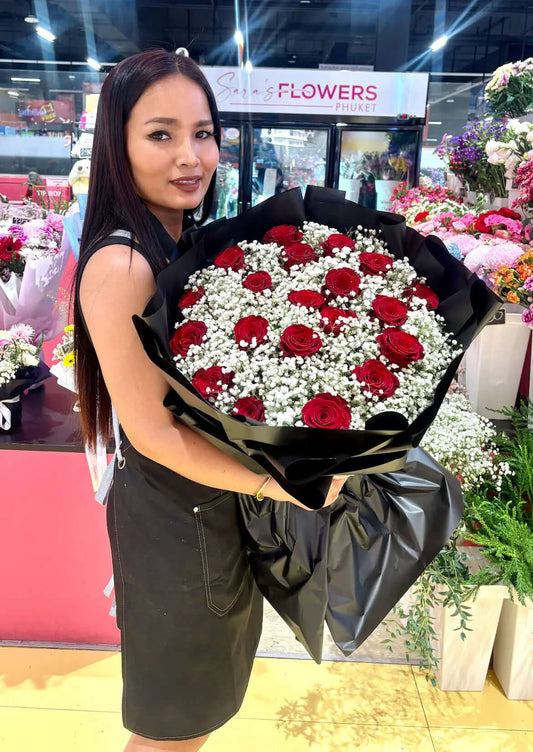 Luxury bouquet of 20 red roses with baby’s breath by Sara’s Flowers Phuket. Same Day Delivery