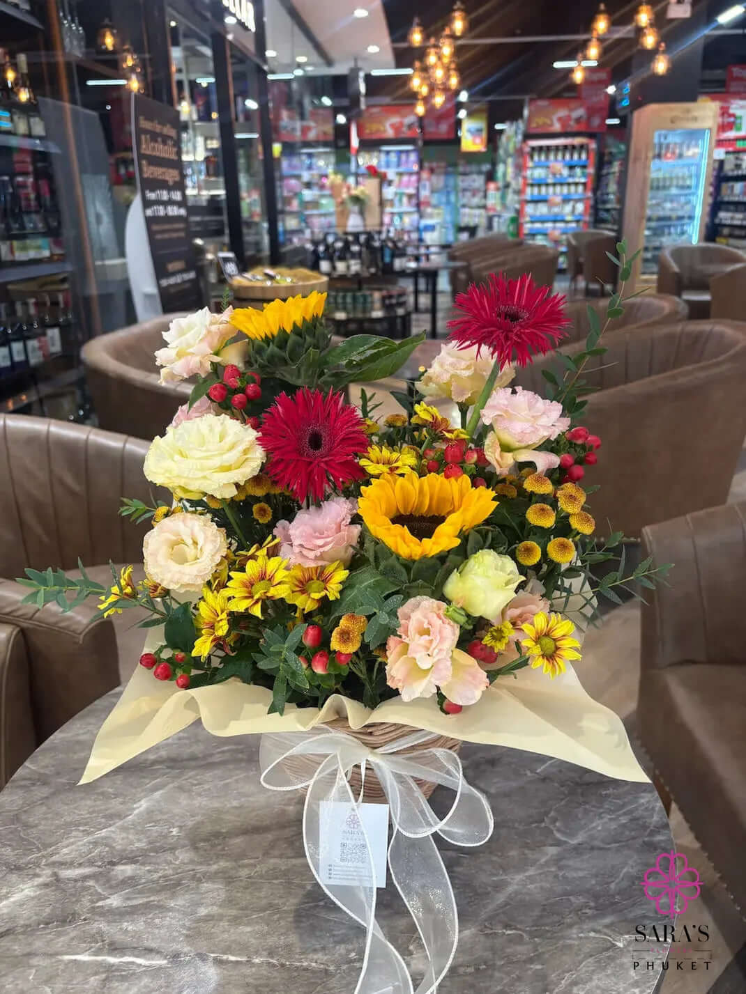 Golden Harvest floral basket with sunflowers and seasonal flowers in Phuket