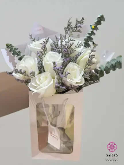Elegant white rose bouquet with baby’s breath and eucalyptus by Sara’s Flowers Phuket