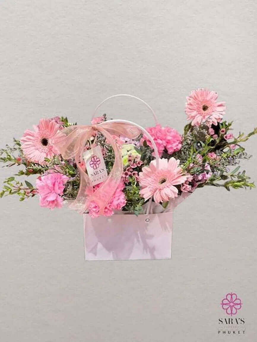 Pink floral gift box with gerberas and carnations by Sara’s Flowers Phuket