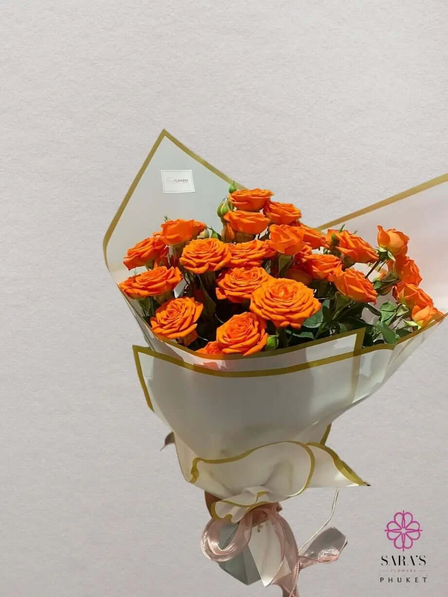 Bright orange tropical bouquet by Sara’s Flowers Phuket