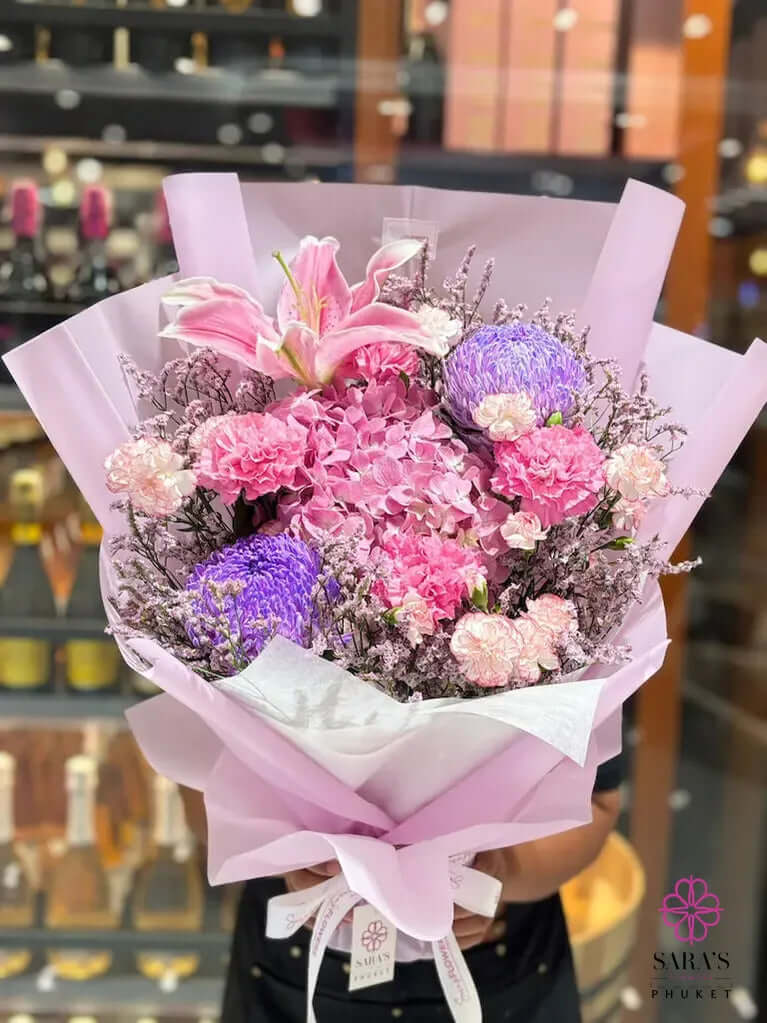 Luxury pastel bouquet with pink lilies, hydrangea, and purple chrysanthemums by Sara’s Flowers Phuket