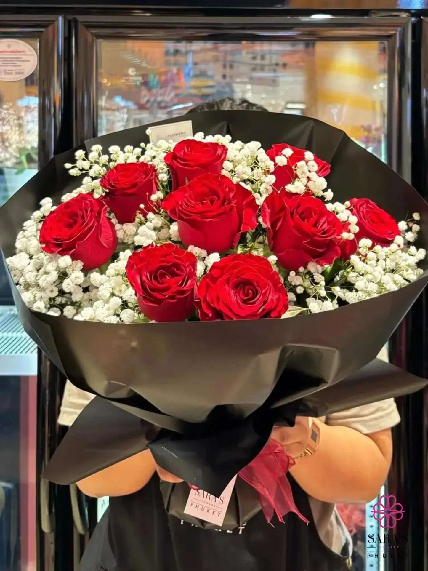 9 red roses bouquet with baby’s breath in black wrapping by Sara’s Flowers Phuket