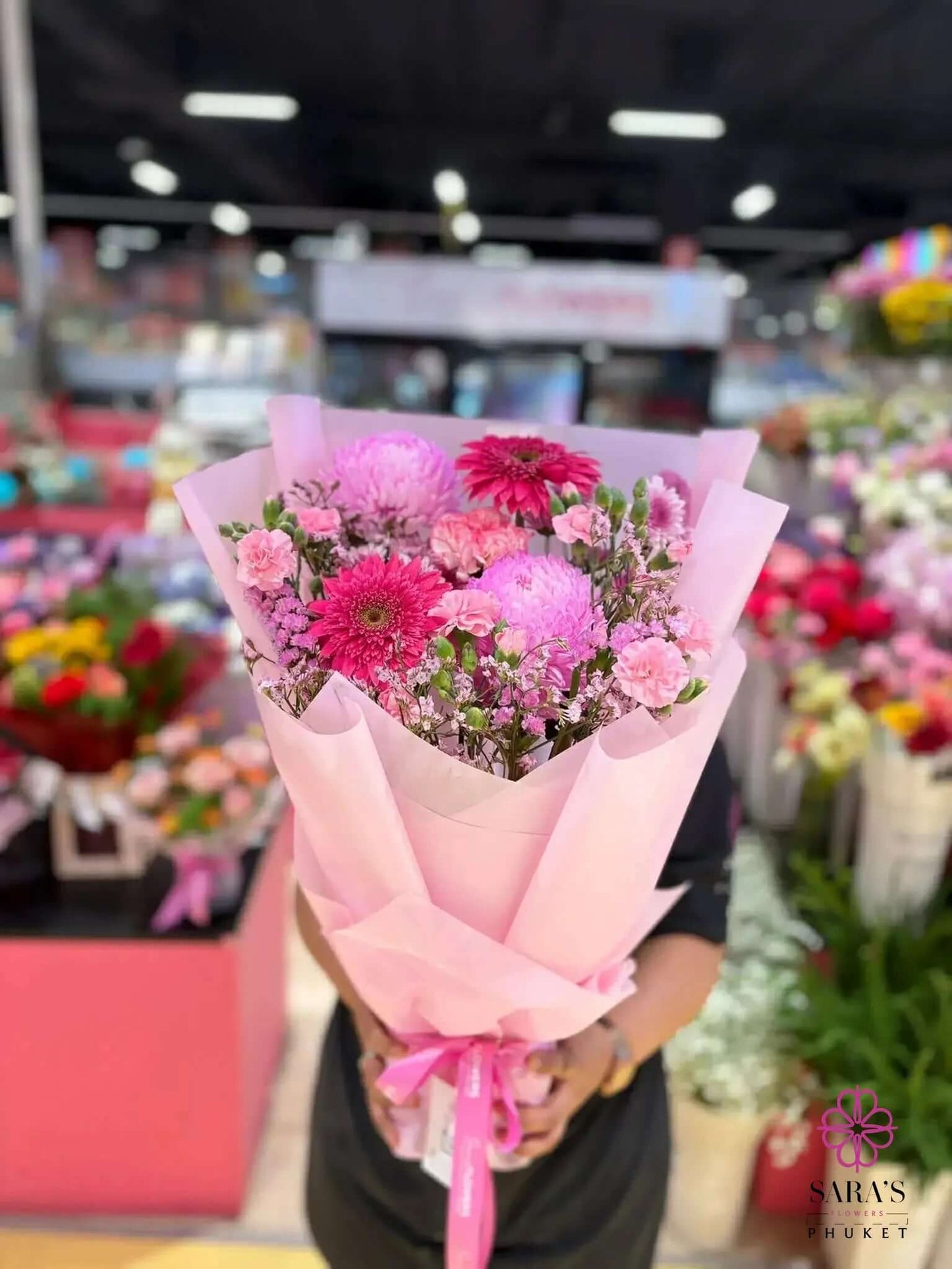 Pink Joy Fresh Mix bouquet with gerberas carnations chrysanthemums and pink wrapping by Sara’s Flowers Phuket