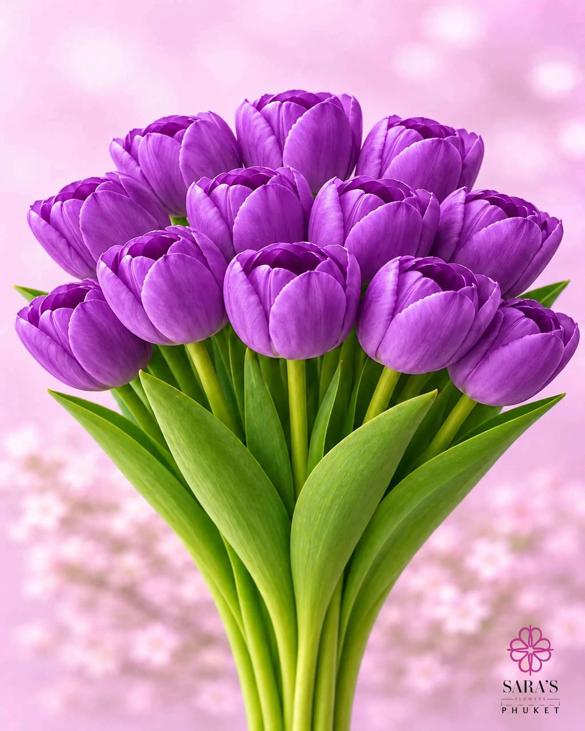 Vibrant purple tulip bouquet with green stems, elegantly arranged against a soft pink background.