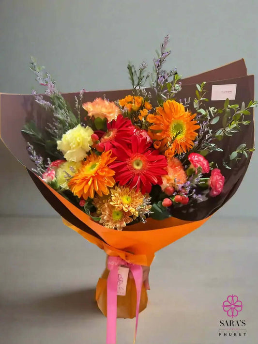 Colours of Fall bouquet with orange gerberas carnations and seasonal flowers in Phuket