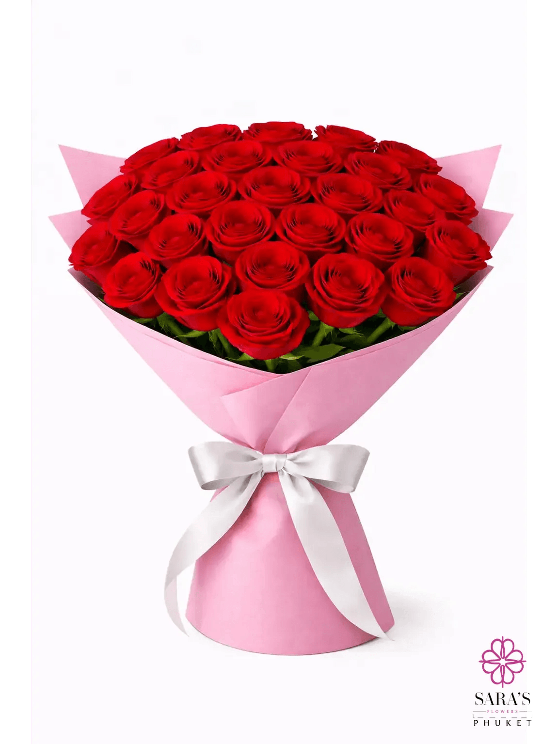 Luxury red rose bouquet with pink wrapping and white ribbon by Sara’s Flowers Phuket.
