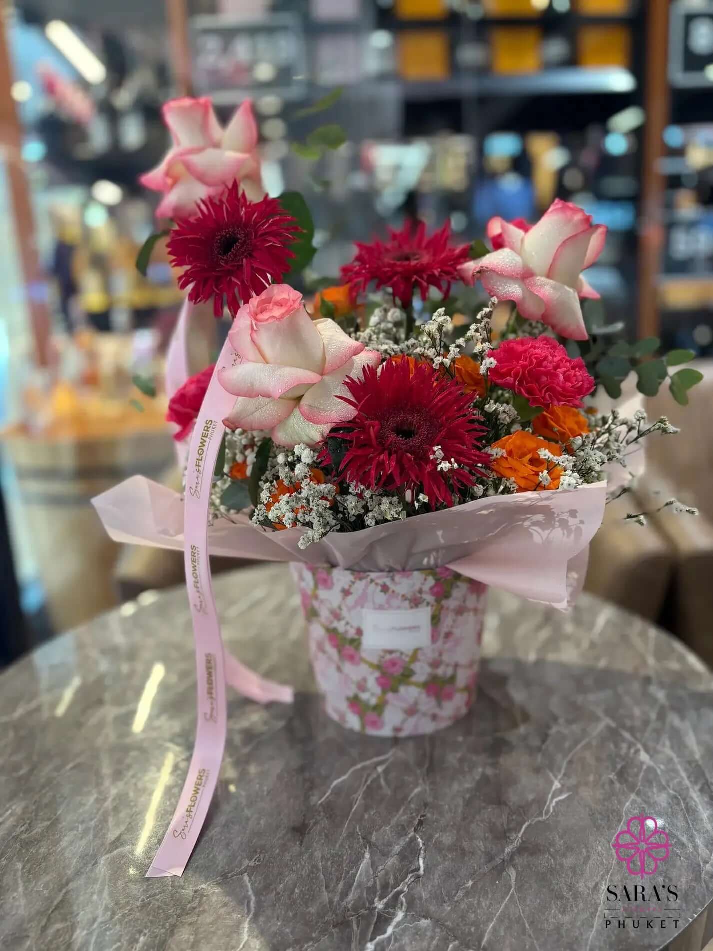 Luxury red and blush pink floral hatbox arrangement by Sara’s Flowers Phuket