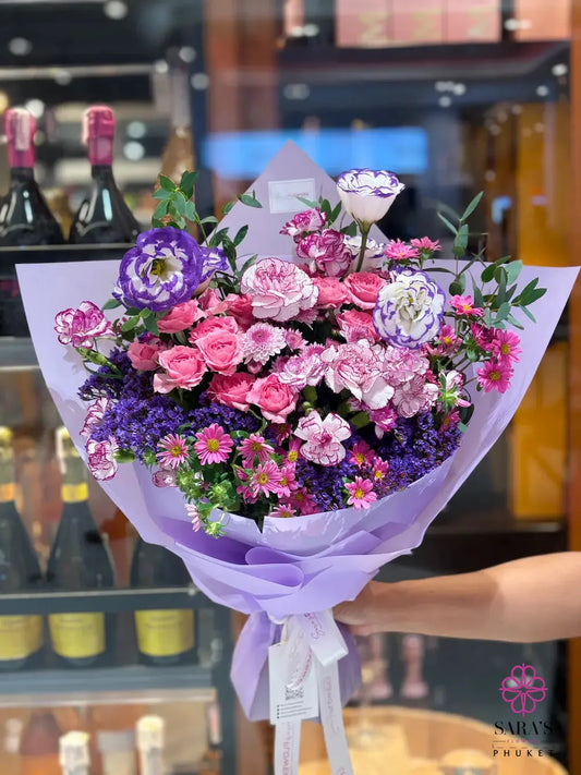 Lavender Melody Bouquet with pink roses purple flowers and pastel wrapping by Sara’s Flowers Phuket