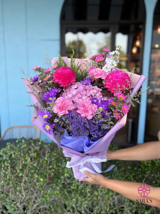 Pink and purple flower bouquet with roses Phuket