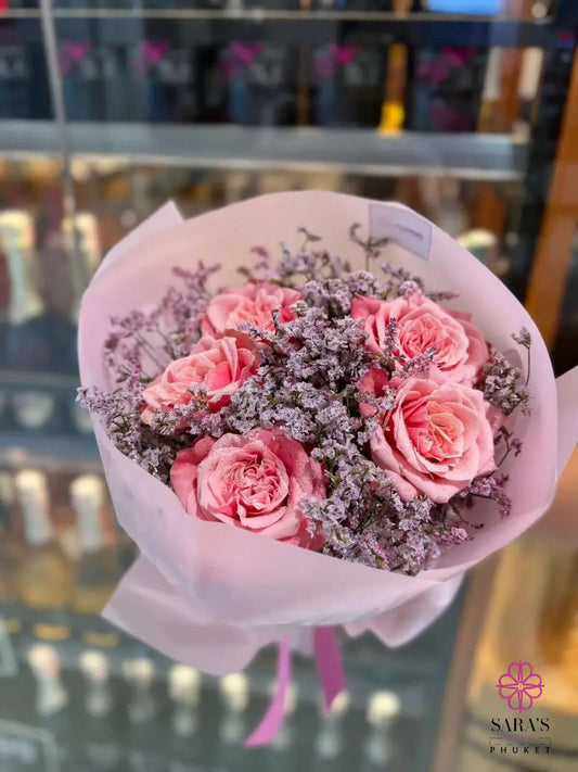 Peach Velvet Rose Bouquet with blush roses carnations and pink wrapping by Sara’s Flowers Phuket