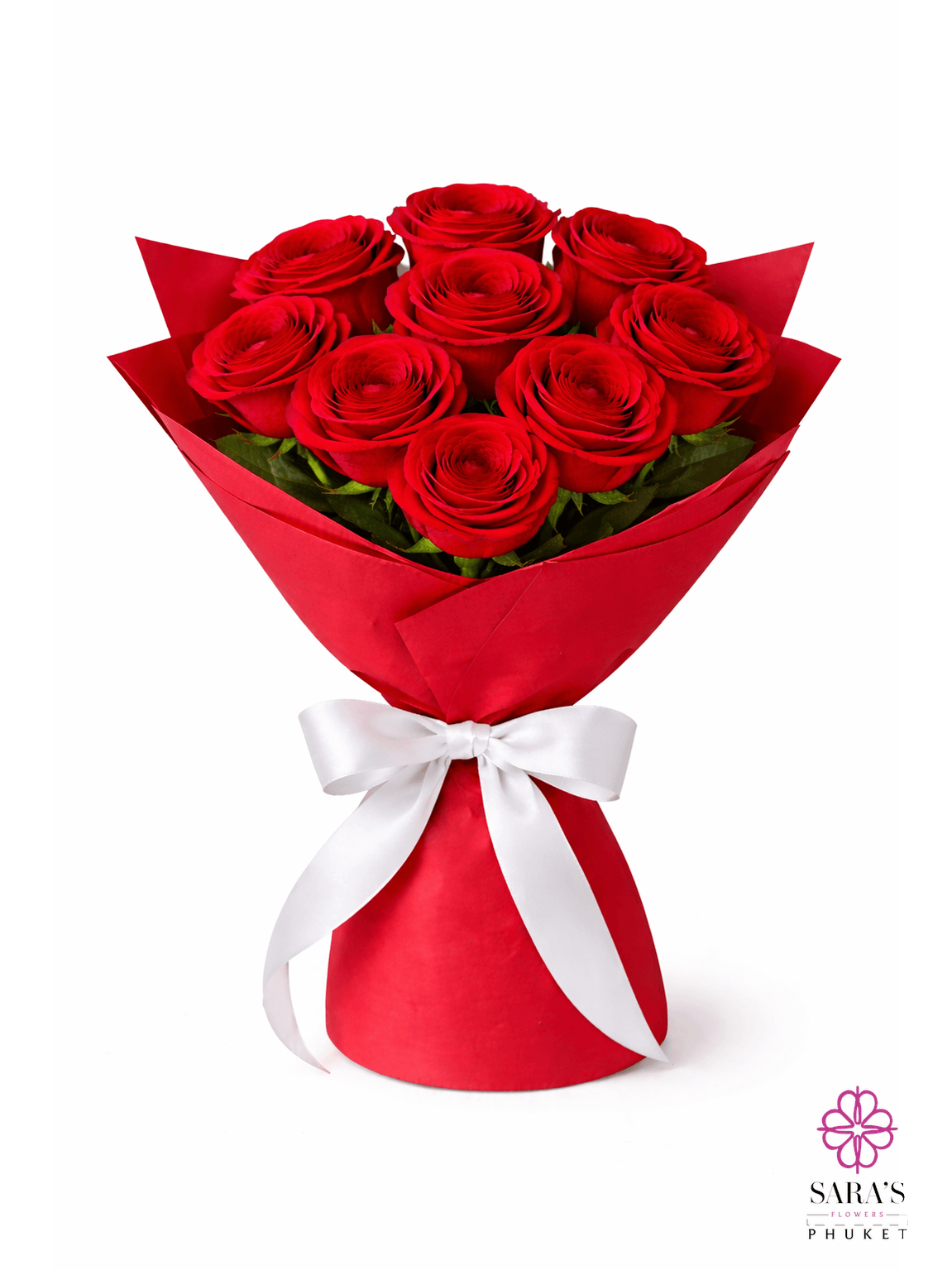 Luxury red rose bouquet with elegant red wrapping and a white satin bow by Sara’s Flowers Phuket.
