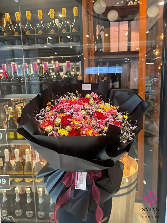 Premium flower bouquet with chocolates and romantic red blooms in Phuket