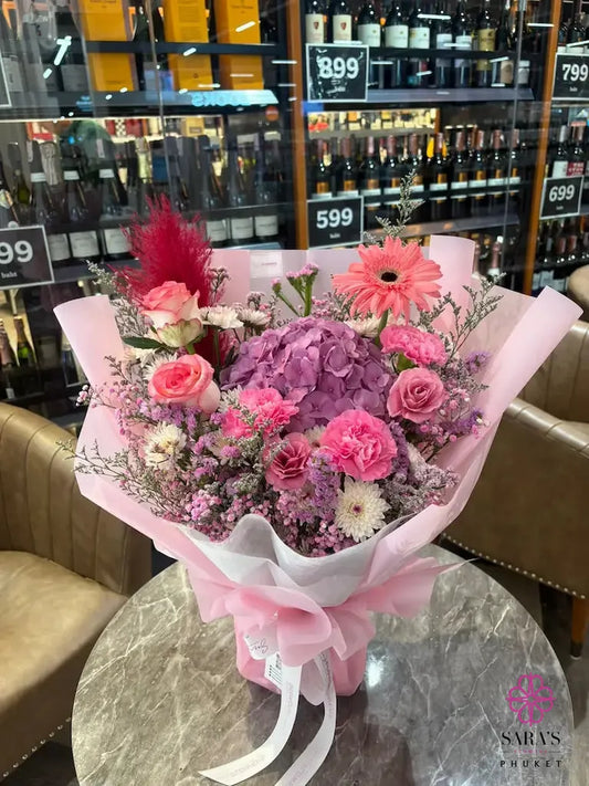 Luxury pink hydrangea and rose bouquet with carnations and premium wrapping by Sara’s Flowers Phuket