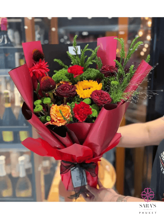 Modern colorful bouquet with roses and seasonal flowers in Phuket