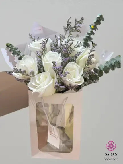 Elegant white rose bouquet with baby’s breath and eucalyptus by Sara’s Flowers Phuket