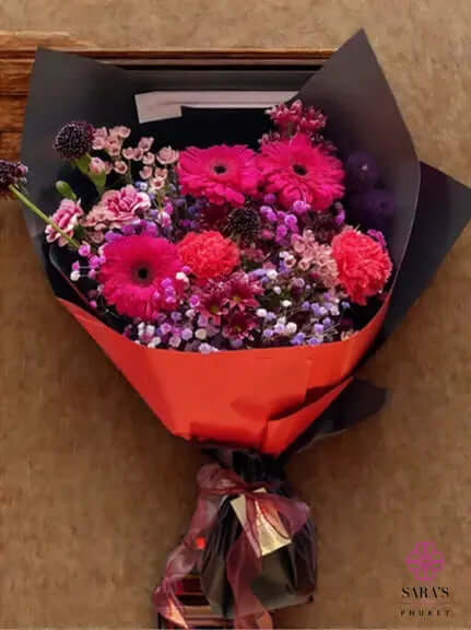 Berry toned flower bouquet with pink roses and gerberas Phuket