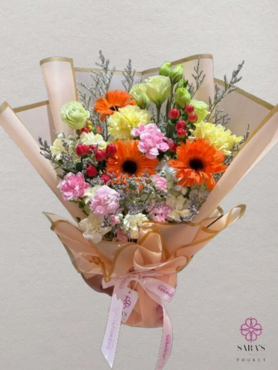 Garden-style bouquet with orange gerberas and pink carnations by Sara’s Flowers Phuket