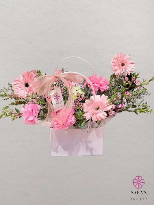 Pink floral gift box with gerberas and carnations by Sara’s Flowers Phuket
