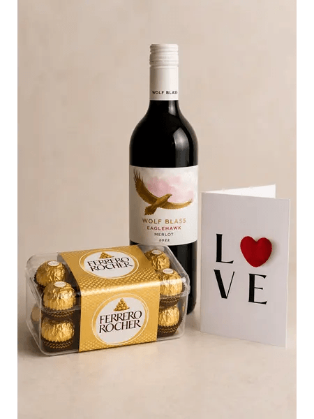 Romantic gift package with red wine, Ferrero Rocher chocolates and premium greeting card by Sara's Flowers Phuket