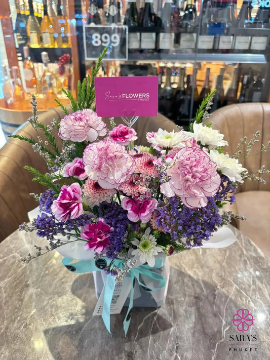 Pinks and Greens bouquet with pink flowers purple blooms and lush greenery by Sara’s Flowers Phuket