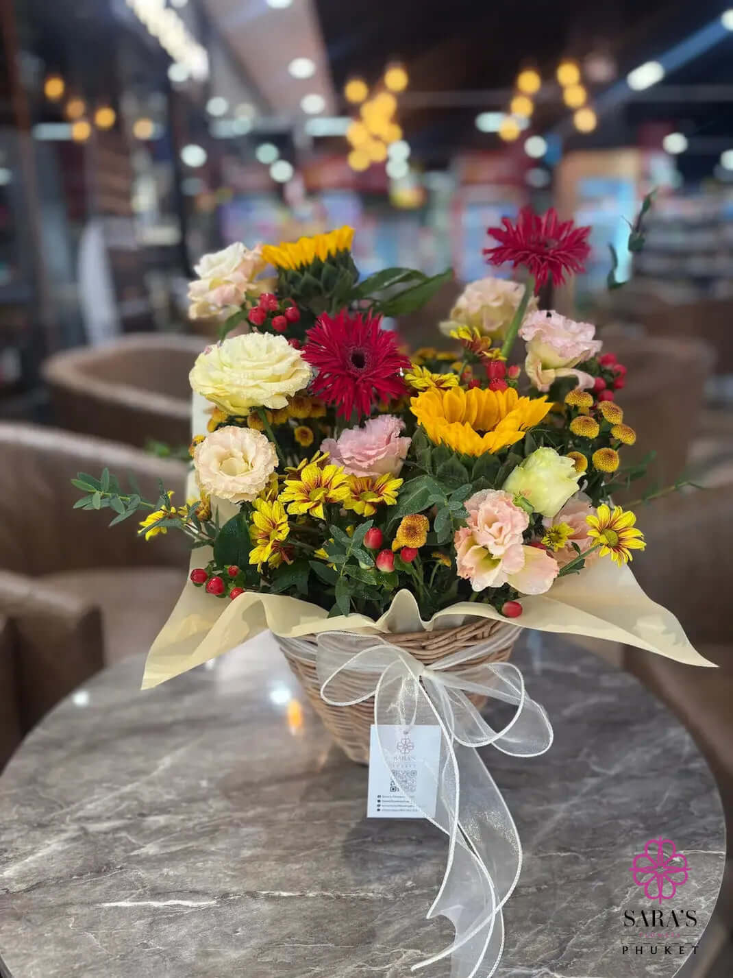 Luxury sunflower and rose flower basket arrangement by Sara’s Flowers Phuket