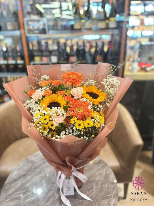 Bright sunflower bouquet with gerbera daisies and carnations by Sara’s Flowers Phuket