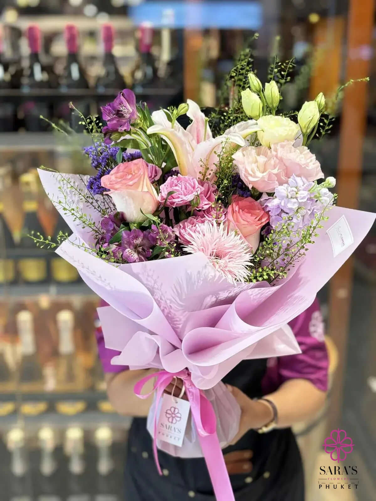Luxury pastel bouquet with pink lilies, spray roses, and lisianthus by Sara’s Flowers Phuket