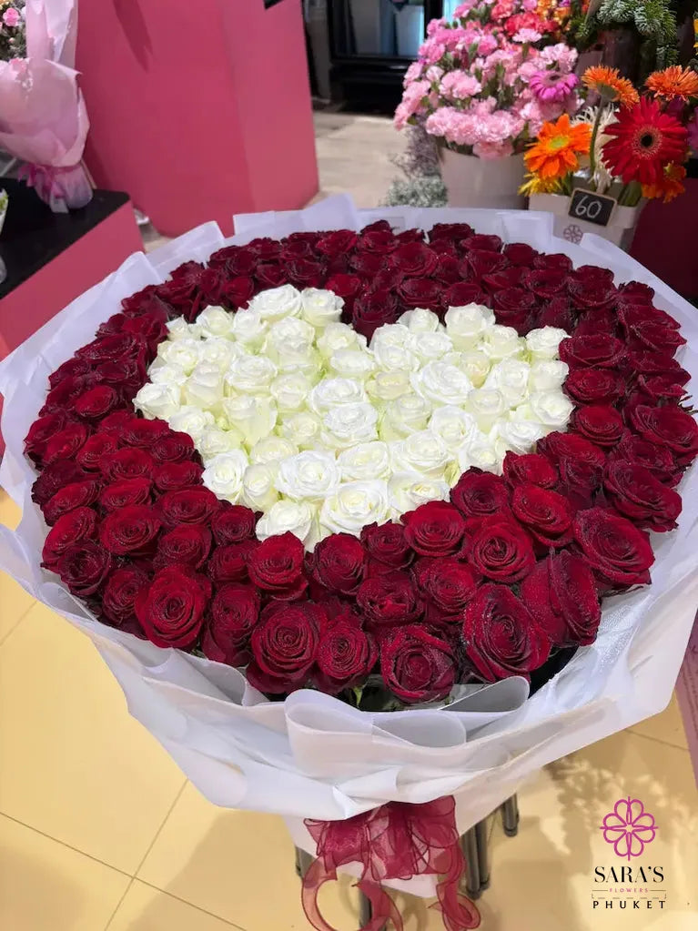 Luxury 150 rose heart bouquet with red and white roses by Sara’s Flowers Phuket