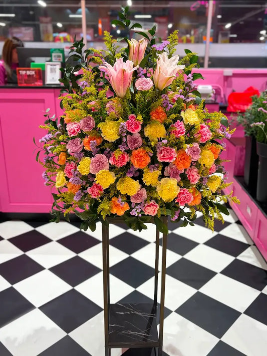 Premium Sunrise Serenade standing floral arrangement with pastel flowers and elegant modern design