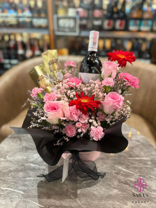 Luxury flower bouquet with wine and chocolates by Sara’s Flowers Phuket