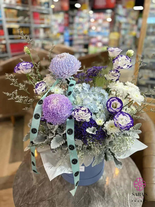 Luxury indigo hydrangea hatbox arrangement by Sara’s Flowers Phuket