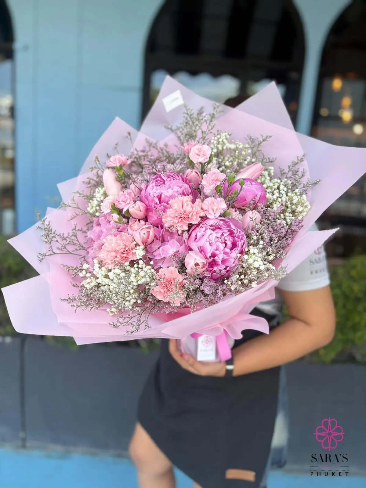 Blush Reverie pink bouquet with spray roses, carnations, baby's breath and luxury pastel wrapping by Sara's Flowers Phuket