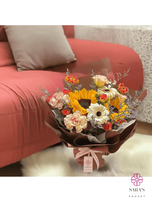 Autumn flower bouquet with sunflowers and roses in Phuket